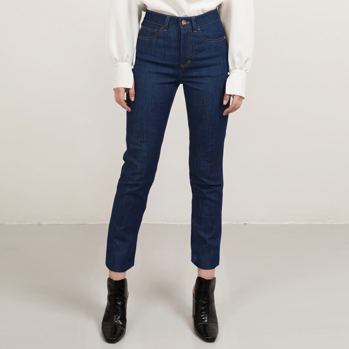 Cropped straight leg denim in mid blue, tobacco stitch