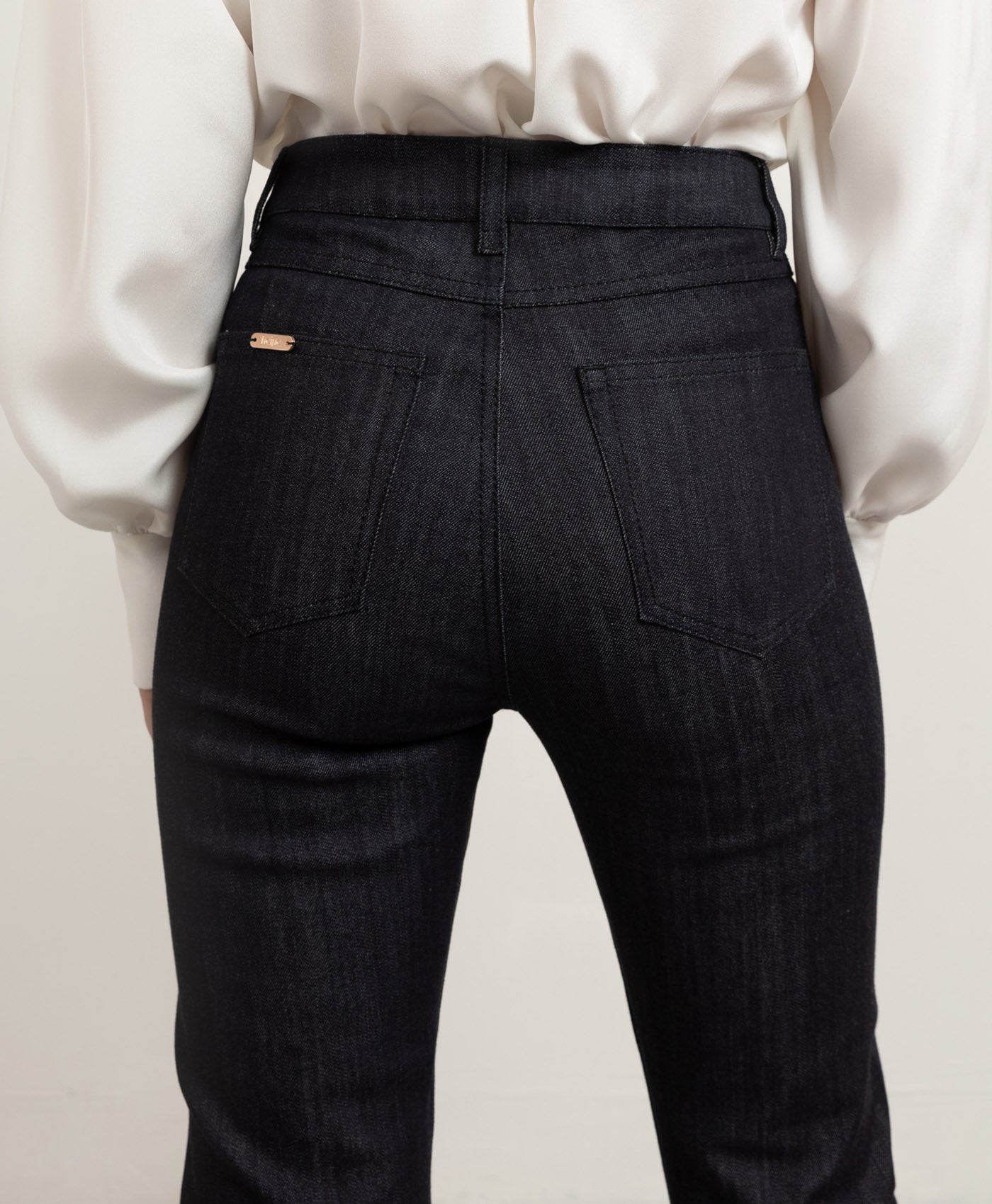 Long blue flared jeans with matching stitching