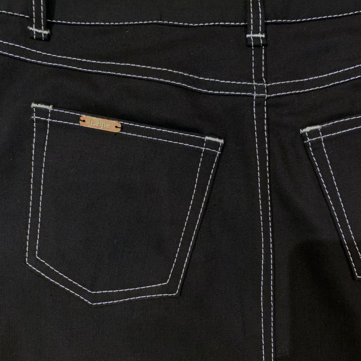 Black short denim skirt with white stitch