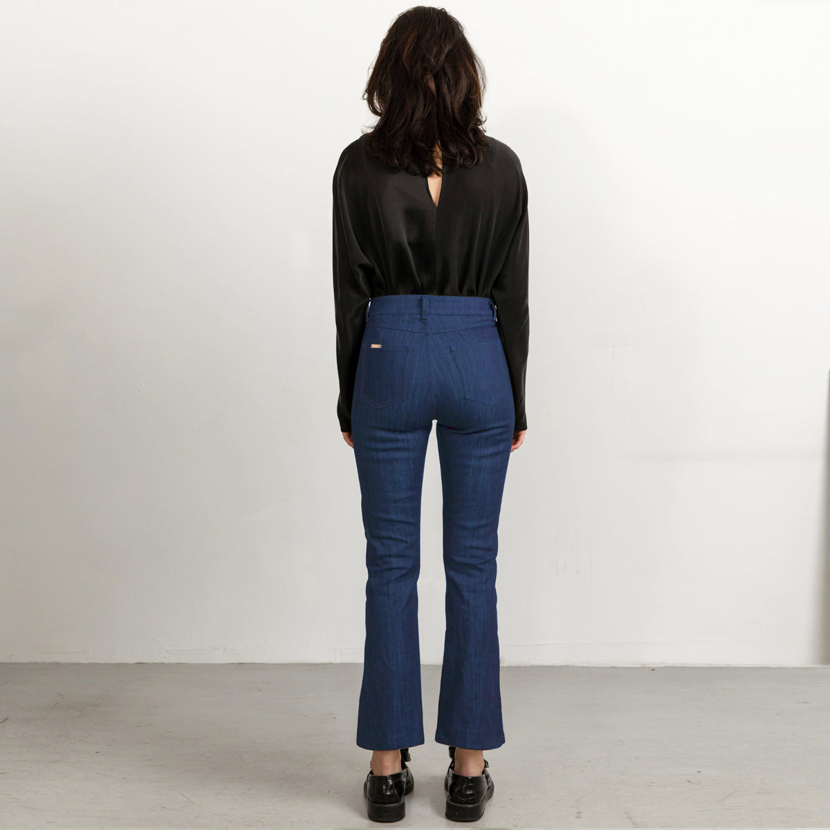 Mid blue flared jeans with matching stitch, cropped