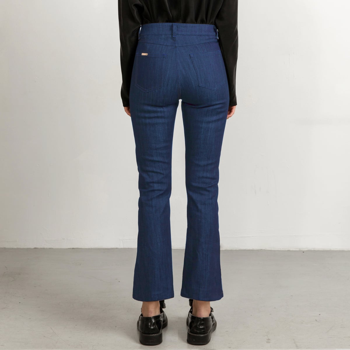 Mid blue flared jeans with matching stitch, cropped