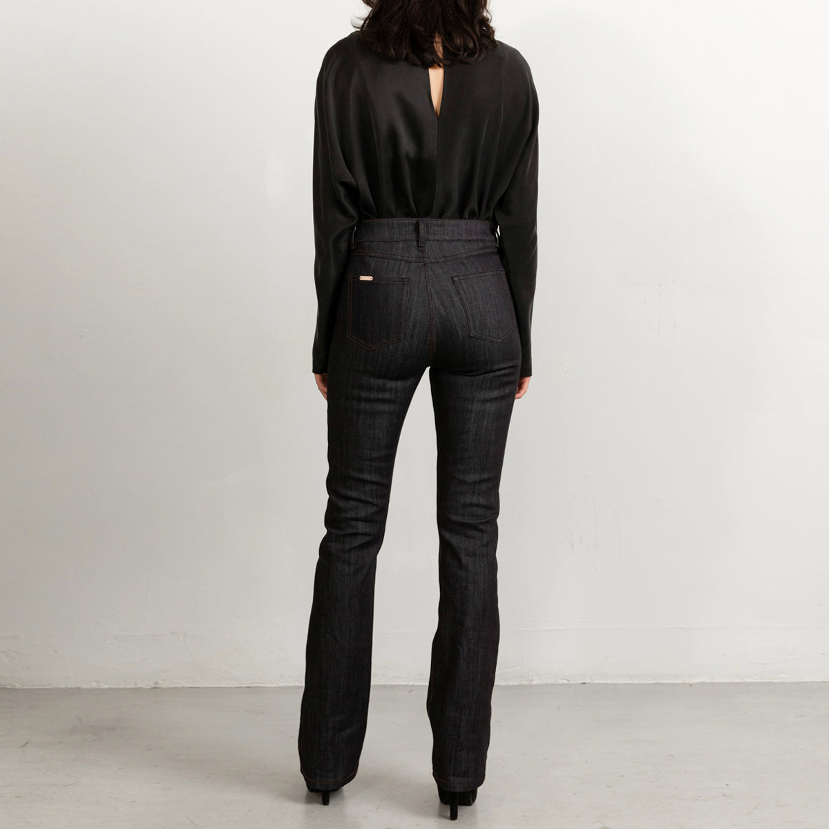 Long blue flared jeans with matching stitching