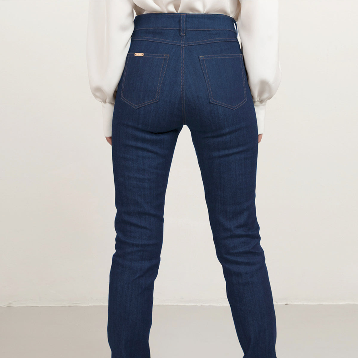 Cropped straight leg denim in mid blue, tobacco stitch