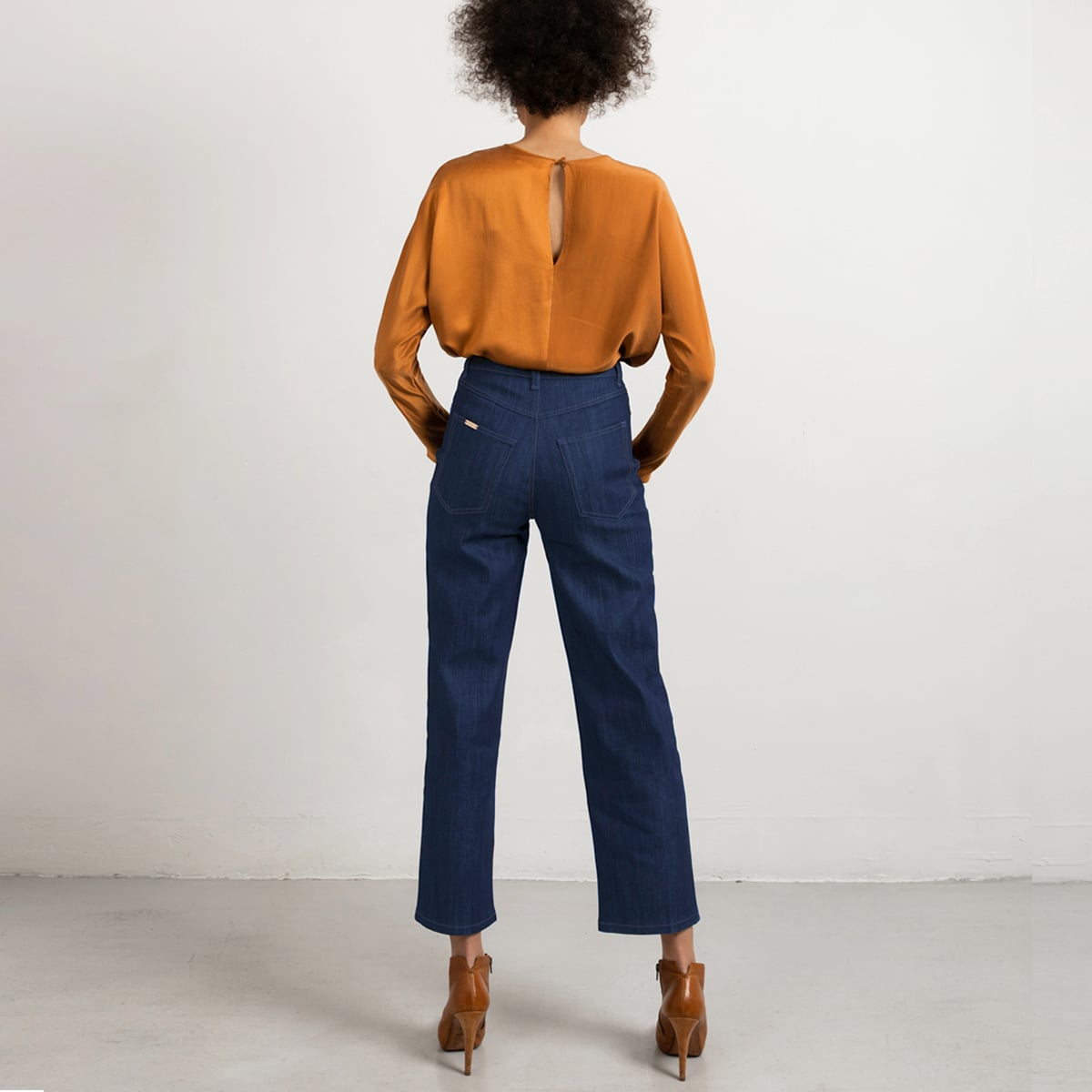 Mid blue wide leg jeans, sand stitch