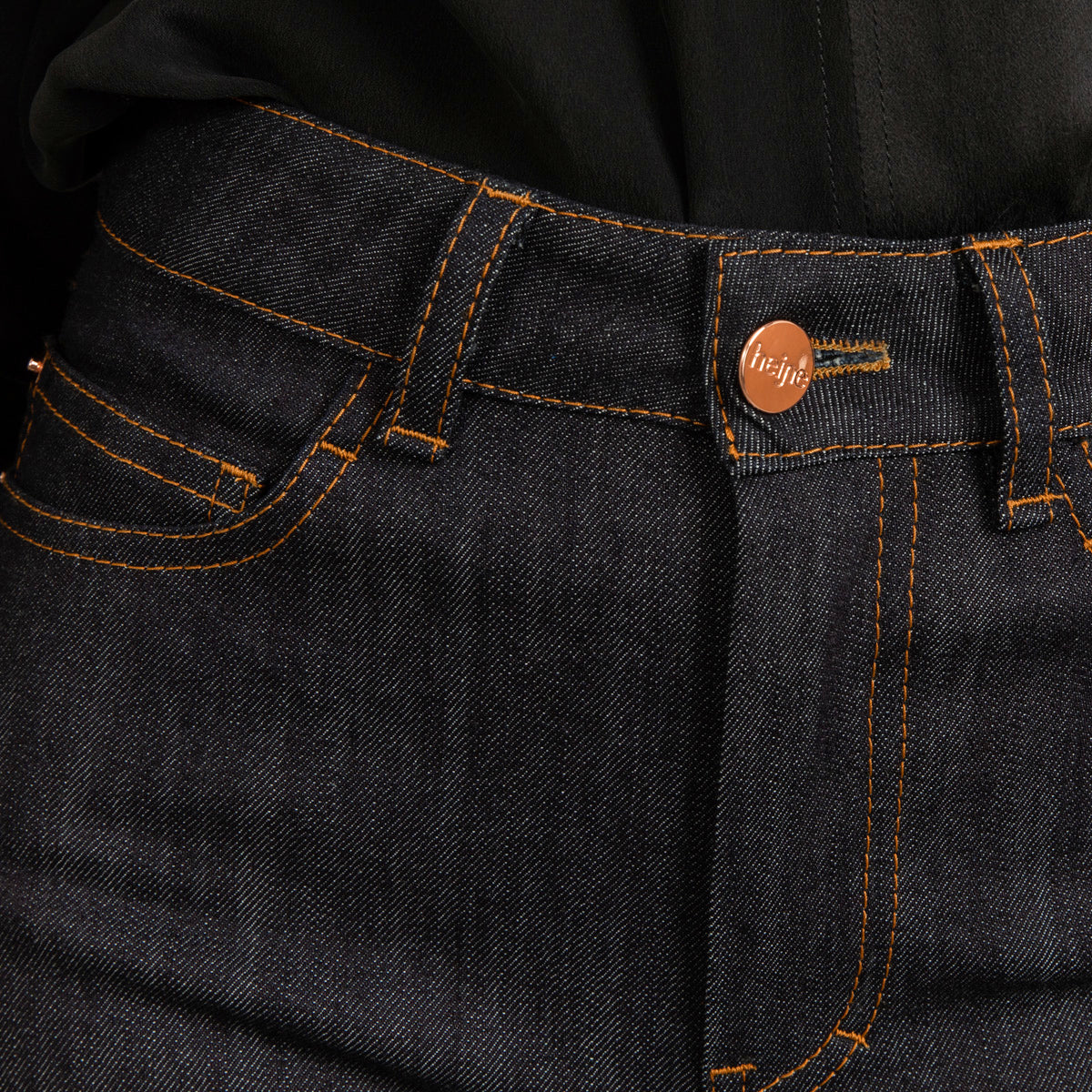 Long blue flared jeans with tobacco stitch