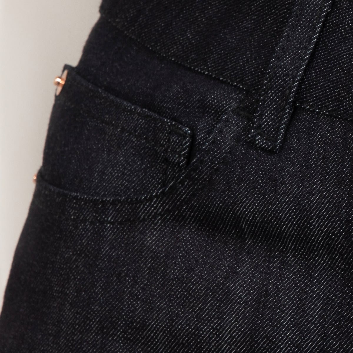 Blue short denim skirt with matching stitch