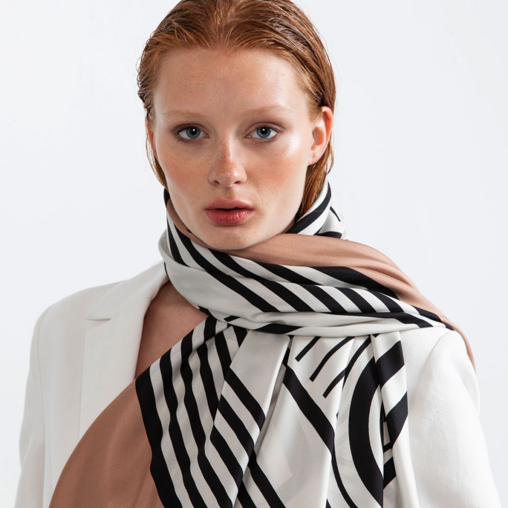 Large silk scarf with signature logo print by Studio Heijne